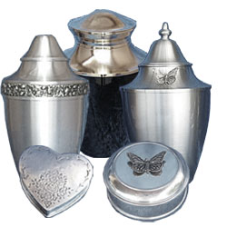 Pewter keepsake cremation urns in different sizes and designs. Pewter urns in traditional urn shapes with different pewter ornaments that can be added.