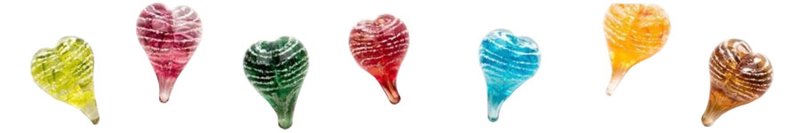 Heart shaped memorial glass urns with a swirl of your loved ones ashes.